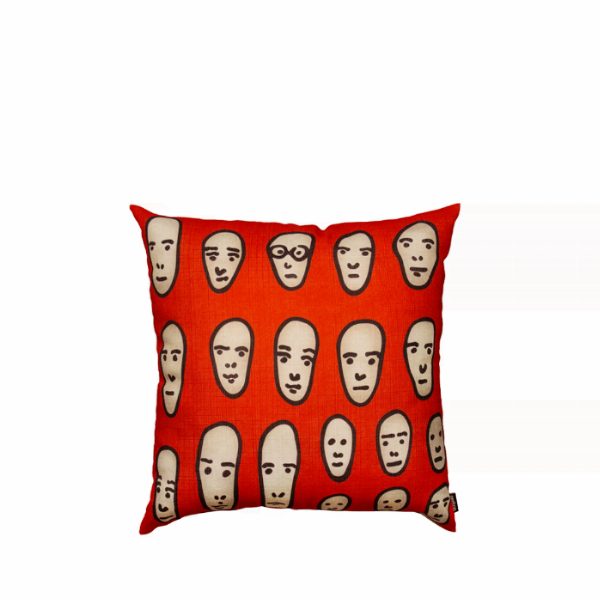 Faces on Red Cushion