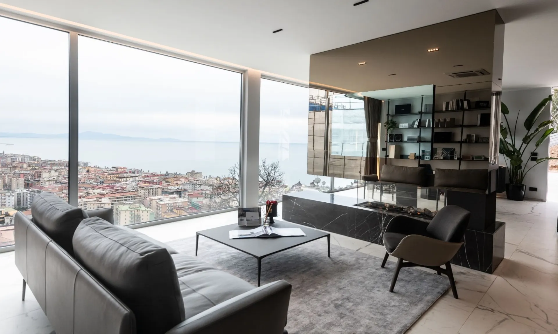 Living con le vetrate aperte sul mare, un progetto IDÀ