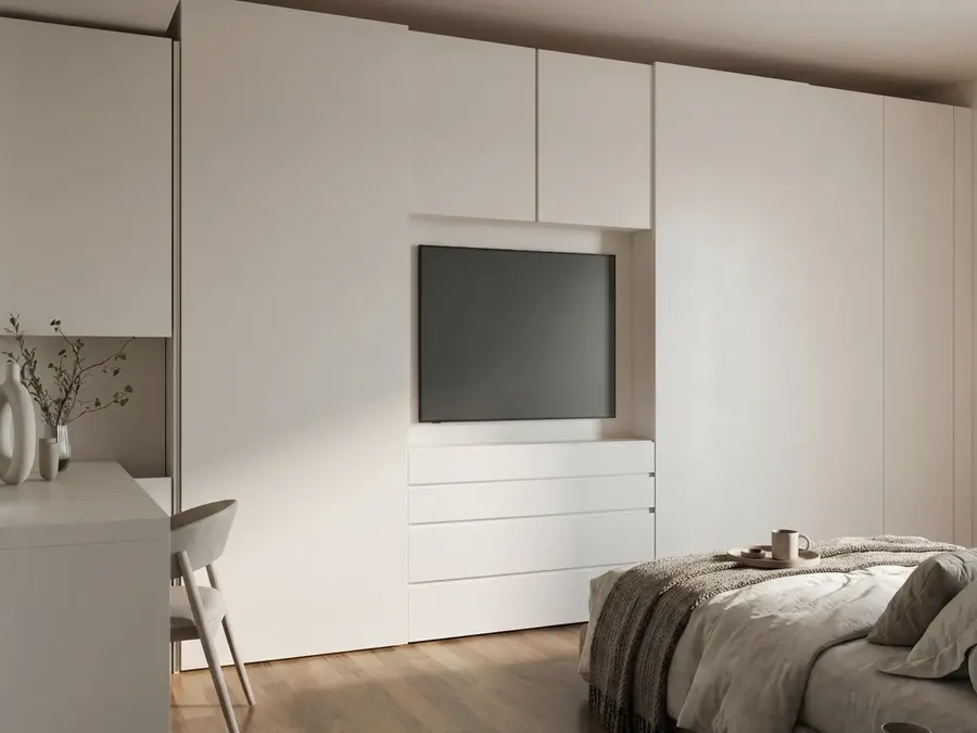 Appartamento: living, cucina e zona notte: camera con armadio a parete e TV
